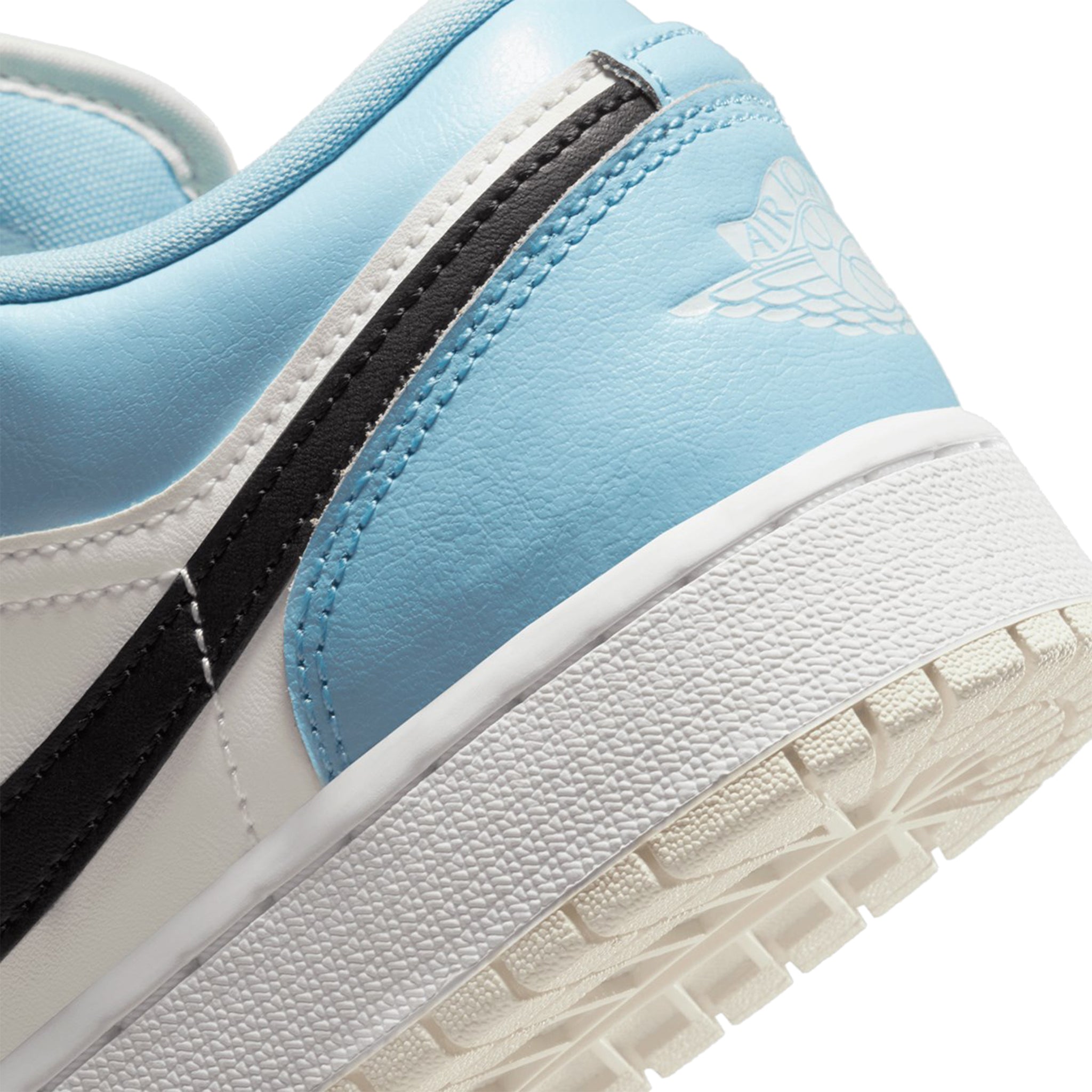 Wings logo view of Air Jordan 1 Low Ice Blue Black (GS) 554723-401